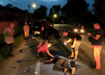 KEADAAN mayat Mohd. Asrol Sulaiman selepas terlibat dalam kemalangan di Kampung Bukit Bayas, Kuala Terengganu hari ini.