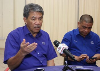 MOHAMAD Hasan dalam sidang akhbar pada sesi libat urus Biro Politik Bahagian-Bahagian UMNO Perak di Bangunan UMNO Perak di Ipoh hari ini. - UTUSAN/MUHAMAD NAZREEN SYAH MUSTHAFA