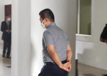 TEH Yoong Hon hadir ke mahkamah mewakili syarikatnya yang didakwa menjual alat ganti kenderaan berjenama tiruan di Kompleks Mahkamah Sultan Salahuddin Abdul Aziz Shah di Shah Alam, Selangor, hari ini.
