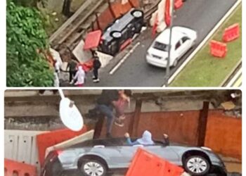 SEBUAH kenderaan dinaiki seorang wanita bersama anak lelakinya berusia empat tahun, terjerumus dalam kawasan baik pulih kabel bawah tanah di Jalan AU3 Setiawangsa, di sini hari ini