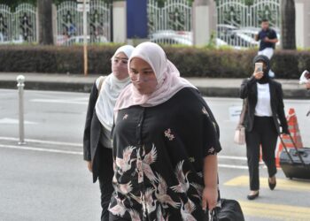SITI Bainun Ahd Razali hadir di Mahkamah Sesyen Kuala Lumpur bagi keputusan kes mengabai dan menganiaya remaja perempuan sindrom Down, Bella. UTUSAN/MOHD. FIRDAUS MOHD. JOHARI.