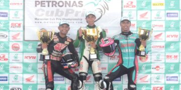 AKID Aziz (tengah) berjaya mengungguli saingan penutup Kejuaraan Malaysia Cub Prix yang berlangsung di Batu Kawan, Pulau Pinang hari ini. - Pix IQBAL HAMDAN