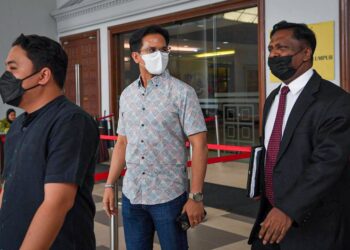 S.M FAISAL S.M Nasimuddin hadir di Mahkamah Majistret Kuala Lumpur bagi perbicaraan kes mencederakan Emilia Hanafi. - UTUSAN/SADDAM YUSOFF