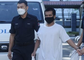MAHKAMAH Tinggi Seremban hari ini melepas dan membebaskan Alsu Nichi atas pertuduhan membunuh rakan senegaranya tiga tahun lalu.-UTUSAN/ MOHD. SHAHJEHAN MAAMIN.