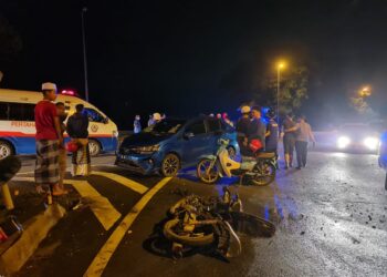 KEADAAN motosikal mangsa selepas terlibat kemalangan di Kilometer 43, Jalan Kota Bharu-Kuala Krai, Machang, malam tadi.UTUSAN/IHSAN POLIS