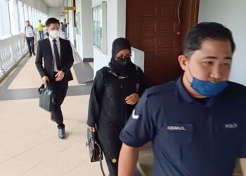 NOORUN Nashriah Ramli hadir di Mahkamah Sesyen Kuala Lumpur bagi menghadapi pertuduhan membuat tuntutan palsu berkaitan insentif Penjana Perkeso. UTUSAN/NORLIZAH ABAS.