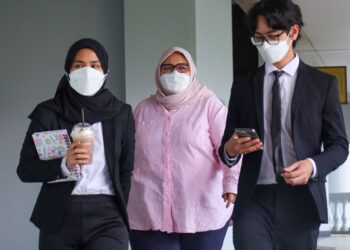 SITI Bainun Ahd Razali hadir di Mahkamah Sesyen Kuala Lumpur atas dua pertuduhan mengabai dan menganiayai remaja Sindrom Down dikenali sebagai Bella. - UTUSAN/SADDAM YUSOFF