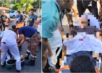 MANGSA dibawa turun oleh anggota bomba sebelum dikejarkan ke Hospital Tampin.