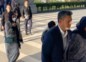 NAJWA Mahiaddin bersama beberapa anggota keluarga tiba di Kompleks Mahkamah Kuala Lumpur bagi memberikan sokongan kepada bapa mereka, Tan Sri Muhyiddin Yassin