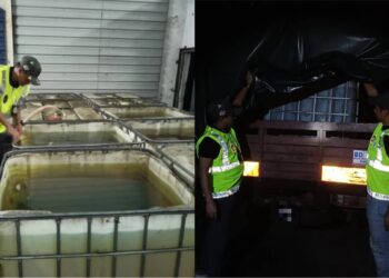 ANGGOTA penguatkuasa KPDN melakukan pemeriksaan dalam serbuan Op Tapis di sebuah premis di sebuah kawasan perindustrian di Nilai, Seremban awal pagi tadi.