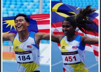 Shereen Samson Vallabouy (kanan) dan Umar Osman mendominasi acara 400m di Sukan SEA Kemboja.-UTUSAN/AMIR KHALID