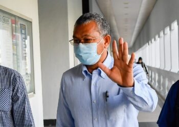 AZLAN Man hadir di Mahkamah Sesyen Kuala Lumpur bagi sebutan kes tuntutan palsu dan AMLA. UTUSAN/SHIDDIEQIIN ZON