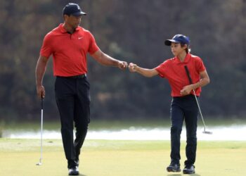 TIGER Woods dan anaknya, Charlie Woods menamatkan Kejohanan PNC di Kelab Golf Ritz Carlton Grande Lakes, Florida semalam selaku naib juara. – AFP