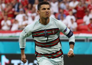 CRISTIANO Ronaldo meraikan jaringannya ketika menentang Hungary di Puskas Arena, Budapest hari ini. - AFP