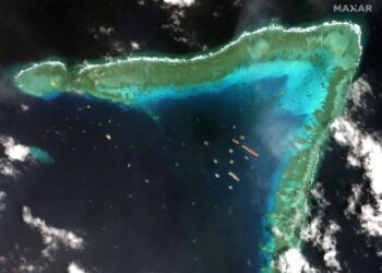 IMEJ satelit menunjukkan beberapa kapal milik China berlabuh di Terumbu Whitsun, 320 kilometer ke barat Bataraza di Palawan di Laut China Selatan. - AFP