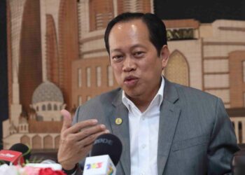 AHMAD MASLAN