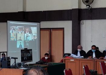PERTUDUHAN rasuah melibatkan bekas gabenor Sumatera Selatan dijalankan secara maya di Mahkamah Rasuah Palembang.-CNN INDONESIA