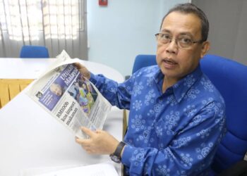 ABDUL FATTAH Abdullah mengulas laporan Utusan Malaysia bertajuk 'RM100 bilion kos import makanan' dan peranan Angkasa dan koperasi membantu pengeluaran makanan negara di Temerloh, Pahang. - UTUSAN/ SALEHUDIN MAT RASAD