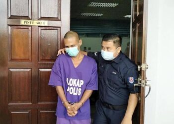 MOHAMAD Firdaus Hassim didakwa di Mahkamah Sesyen Taiping atas pertuduhan cuai sehingga menyebabkan anak perempuannya termakan 'biskut ganja'. - UTUSAN