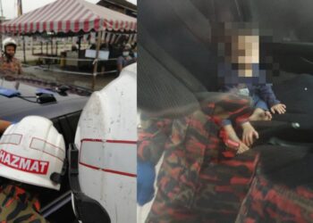 ANGGOTA bomba berusaha mengeluarkan bayi yang terkunci dalam kenderaan milik bapanya di Taman Negeri, Port Dickson pagi tadi. - IHSAN BOMBA