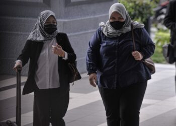 SITI Bainun Ahd Razali hadir di Mahkamah Sesyen Kuala Lumpur bagi perbicaraan kes mengabai dan menganiaya remaja sindrom down, Bella. - UTUSAN/FAIZ ALIF AHMAD ZUBIR