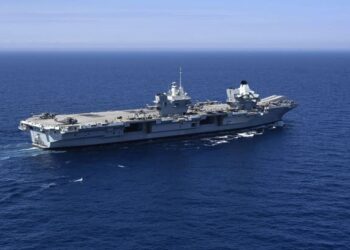 KAPAL HMS Queen Elizabeth kini berlayar di perairan Asia. - AFP