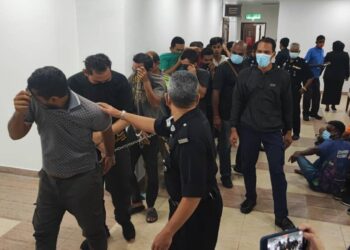SERAMAI 14 individu dihadapkan di Mahkamah Majistret George Town, Pulau Pinang hari ini atas pertuduhan mencuri dan menghapuskan kabel milik Telekom Malaysia (TM) awal bulan ini. - Pic: IQBAL HAMDAN