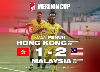Safwan Mazlan meraikan jaringan ketika membantu Malaysia B-22 menjulang Piala Merlion.-IHSAN FAM