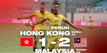Safwan Mazlan meraikan jaringan ketika membantu Malaysia B-22 menjulang Piala Merlion.-IHSAN FAM