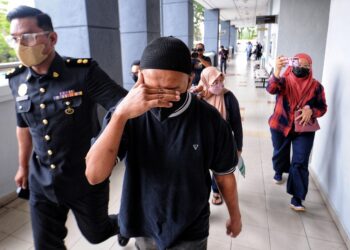 AHMAD Fairuzaman Ahmad Bolia ketika hadir di Mahkamah Sesyen Seremban, Negeri Sembilan. - UTUSAN/MOHD. SHAHJEHAN MAAMIN