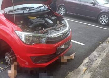 KEADAAN mangsa maut dihempap kereta sendiri di PPAM, Presint 5, Putrajaya.