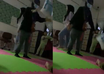 TANGKAP layar daripada video seorang wanita dipercayai mencampak objek dipercayai bungkusan terhadap seorang bayi yang sedang meniarap yang didakwa berlaku di pusat asuhan kanak-kanak di Pulau Pinang yang tular di dalam media sosial.