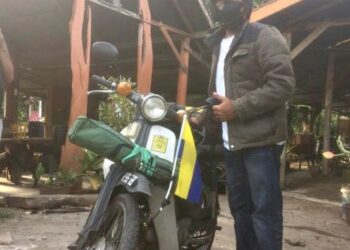 ABDUL Halim Mat melakukan jelajah solo di semenanjung Malaysia dengan menunggang motosikal kapcai jenis Honda C70.