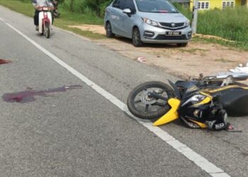 MOTOSIKAL Nor Hidayah Abdullah yang terlibat dalam kemalangan maut di Kilometer 29, Kampung Charuk Padang di Jalan Jeniang Sik-Pedu di Sik, semalam.