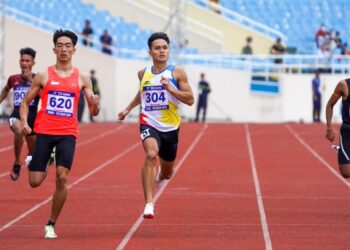 AKSI Jonathan Nyepa di peringkat saringan acara 200 meter pada Sukan SEA 2021 di Stadium Nasional My Dinh, Hanoi, hari ini.  - UTUSAN/SHIDDIEQIN ZON