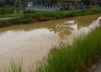 LOKASI kejadian mangsa ditemukan lemas di tali air Kampung Jambu Merah, Melor dekat Kota Bharu, Kelantan, semalam. - IHSAN PENDUDUK