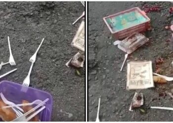 TANGKAP layar video tular dalam media sosial memaparkan makanan jualan seorang peniaga berselerak di atas jalan raya dalam kejadian di percayai berlaku di Kampung Renggoh, Jalan Johol, Air Mawang, Kuala Pilah, Negeri Sembilan.