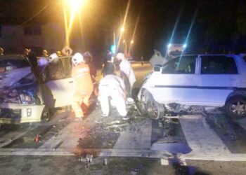 LOKASI kejadian maut membabitkan dua buah kereta di Kilometer 29 Jalan Seremban-Kuala Pilah, Kuala Pilah awal pagi tadi.-IHSAN POLIS