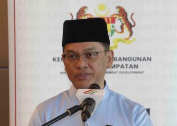 MOHD. Na'im Mokhtar pada sidang akhbar selepas majlis MoU antara Swcorp dan Jawi di Kementerian KPKT, Putrajaya. - UTUSAN/FAISOL MUSTAFA