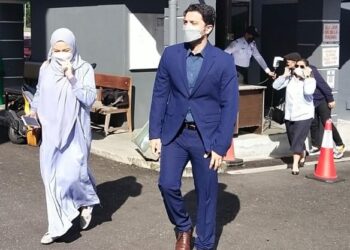 NOOR Neelofa Mohd. Noor dan Muhammad Harris tiba di Kompleks Mahkamah Seremban, Seremban, hari ini. - FOTO/NOR SHAFAWATI YUP