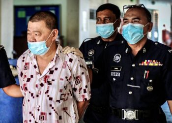 ONG Lai Seng dibawa ke Mahkamah Majistret Georgetown, Pulau Pinang, hari ini. - UTUSAN/AMIR IRSYAD OMAR
