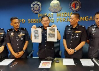TAN Cheng San (tengah) menunjukkan gambar sebahagian motosikal yang disita dalam Op Samseng Jalanan baru-baru ini dalam sidang akhbar di IPD Seberang Perai Tengah, Bukit Mertajam, Pulau Pinang, hari ini.