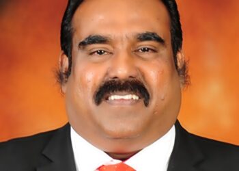 M. RAVI