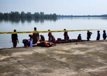 LOKASI pencarian remaja lelaki dikhuatiri lemas di Sungai Perak dekat Jeti Kampung Terengganu di Teluk Intan semalam. - UTUSAN