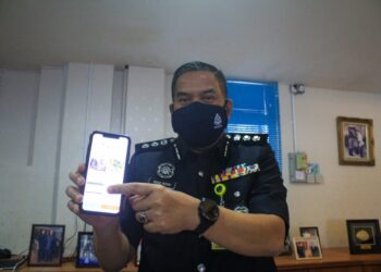 MOHD. ROSNI Mohd. Lazim dalam sidang akhbar mengenai kes jenayah siber di IPK Pulau Pinang hari ini. - UTUSAN ONLINE