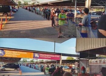 GAMBAR tular pengguna yang beratur panjang untuk memasuki sebuah pasar raya di Ipoh hari ini. - UTUSAN GAMBAR /MEDIA SOSIAL